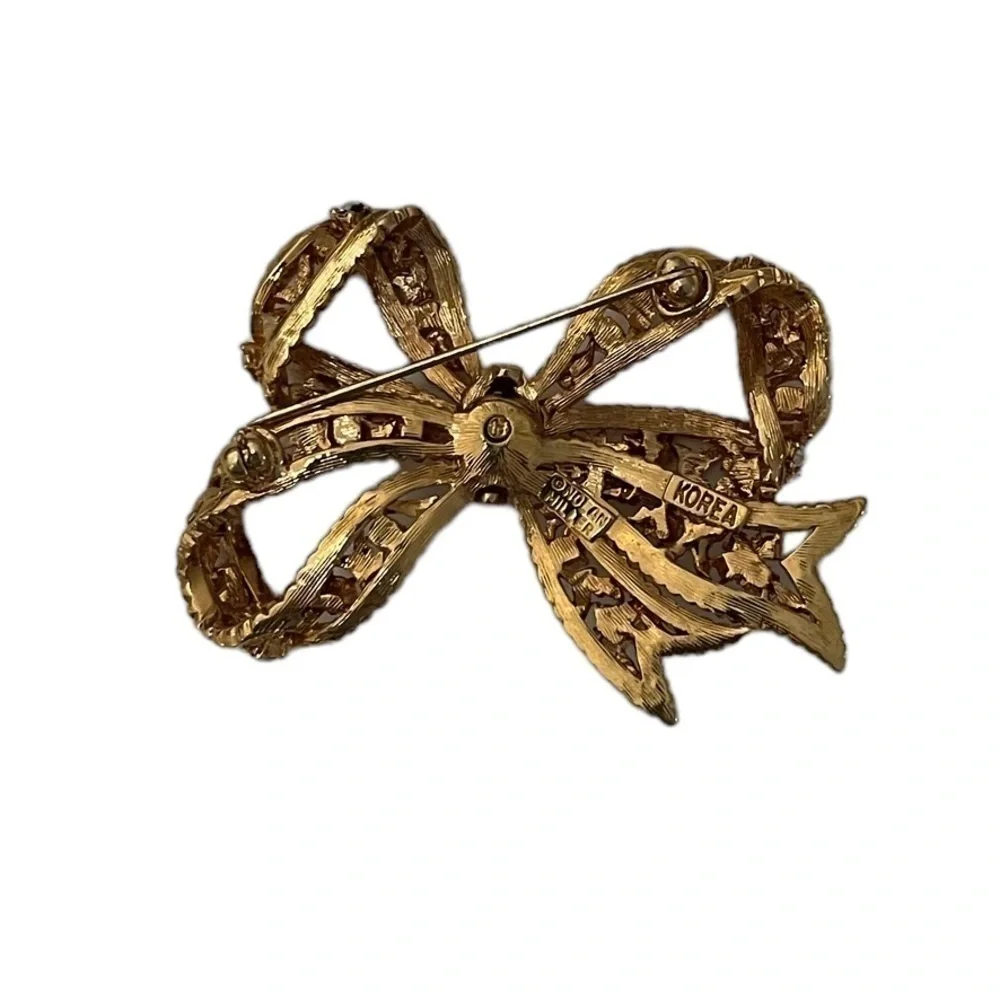 Nolan Miller Unique Gold & Crystal Bow Brooch